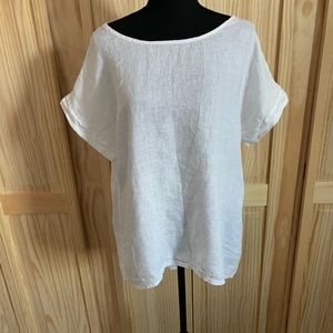 White linen blouse with button detailing